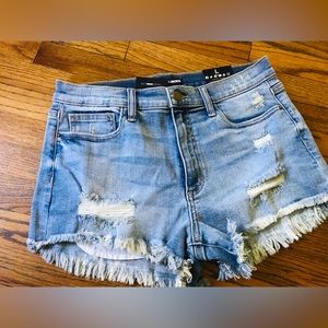 Fashion Nova medium blue wash jean shorts. 4 pockets w/rips size: L